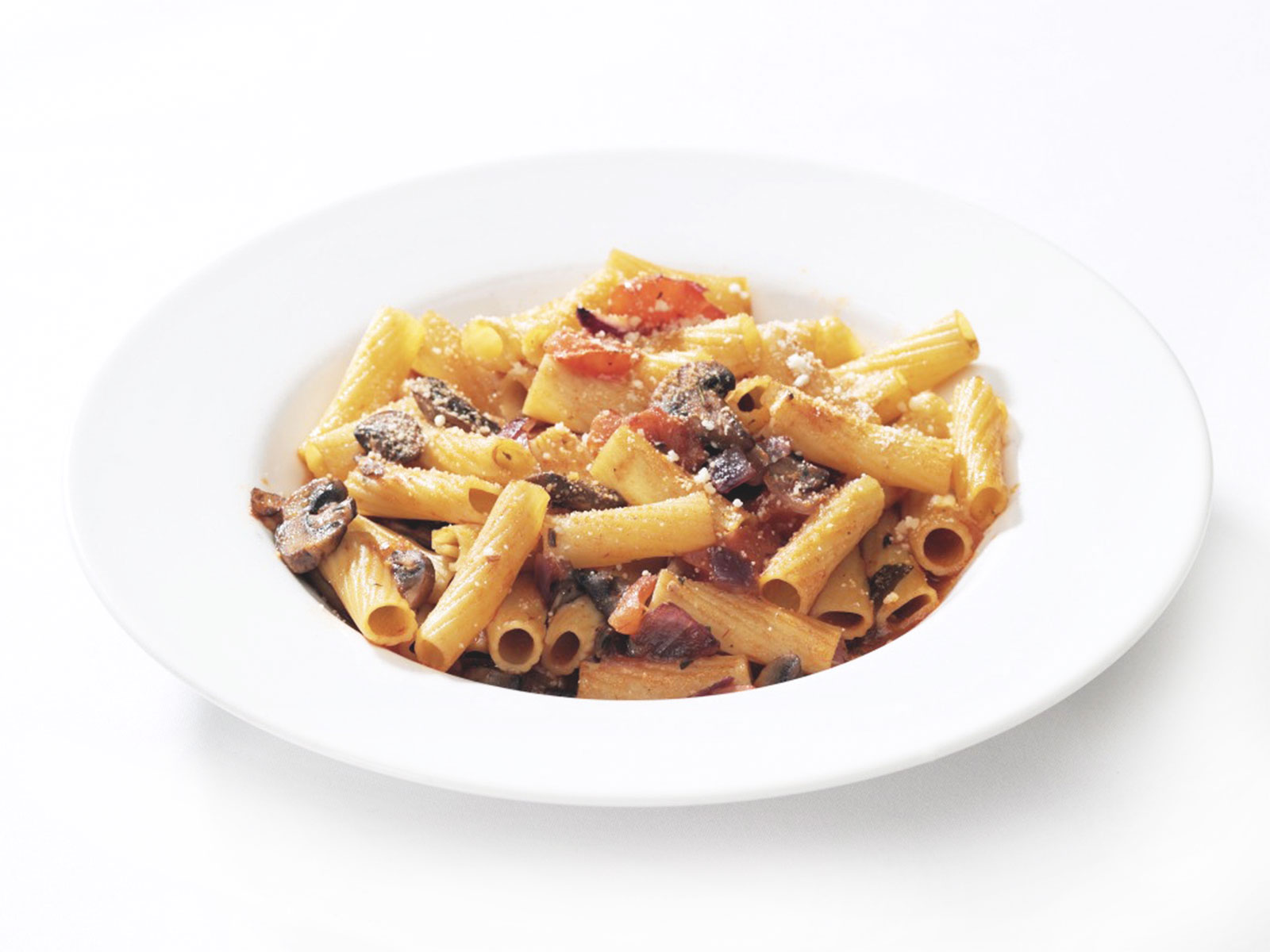 Rigatoni pasta in tomato sauce with aubergine, mozzarella and fresh basil